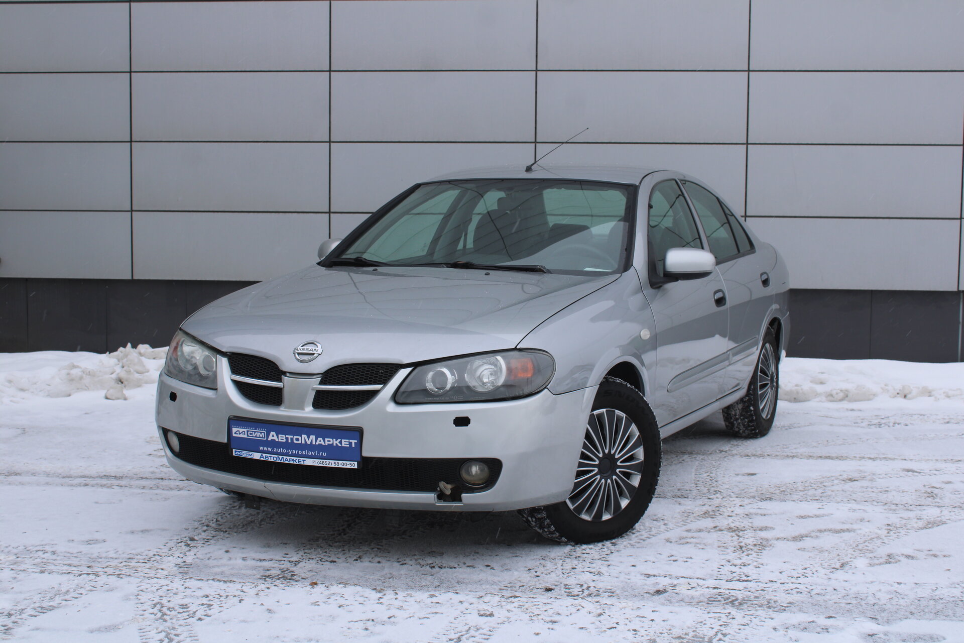 Серый Nissan Almera 1.5 MT (98 л.с.) 2006