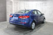 Серый Kia Rio 1.6 AT (123 л.с.) 2015 фото 5
