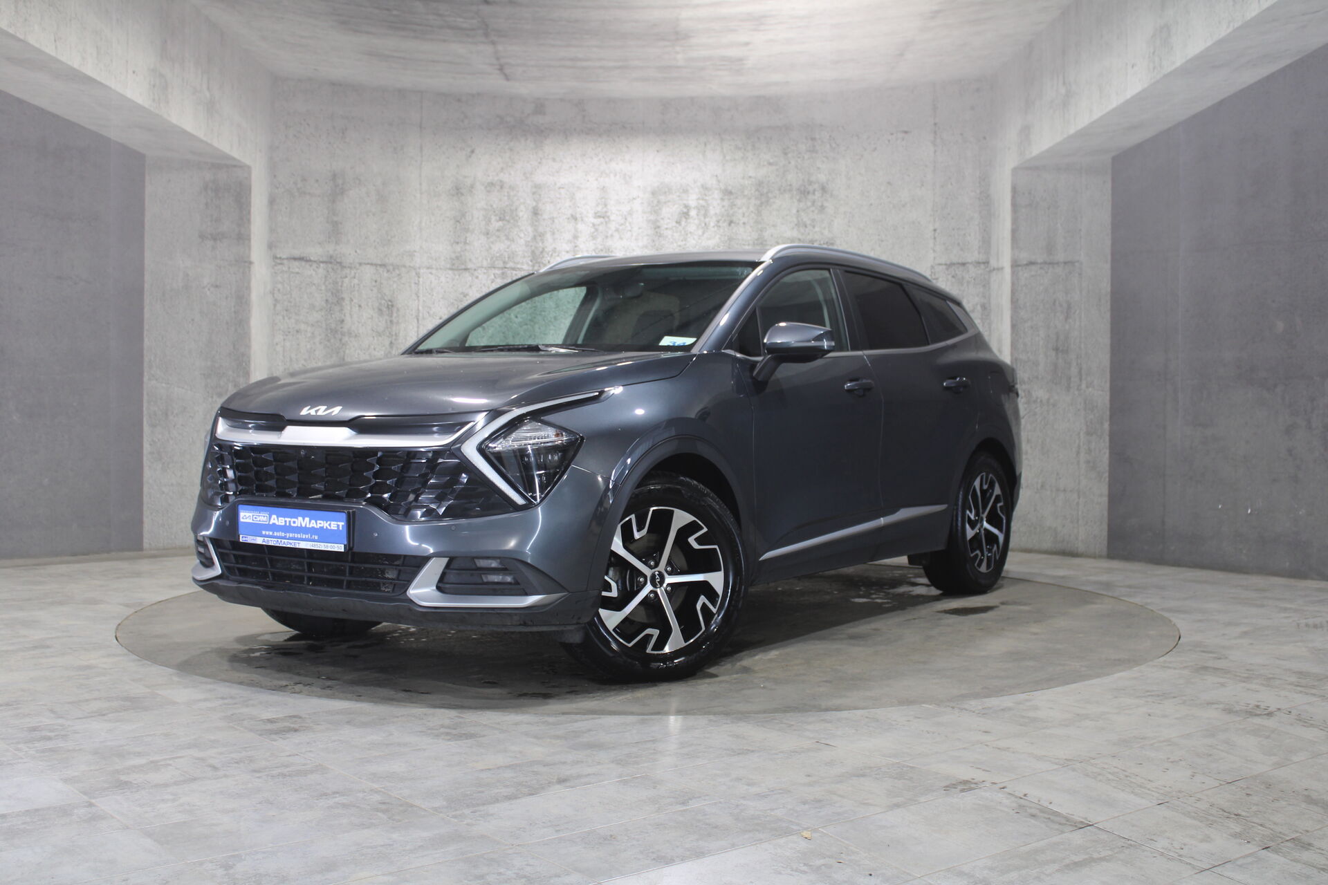 Серый Kia Sportage, V 2.5 AT (190 л.с.) 4WD 2022