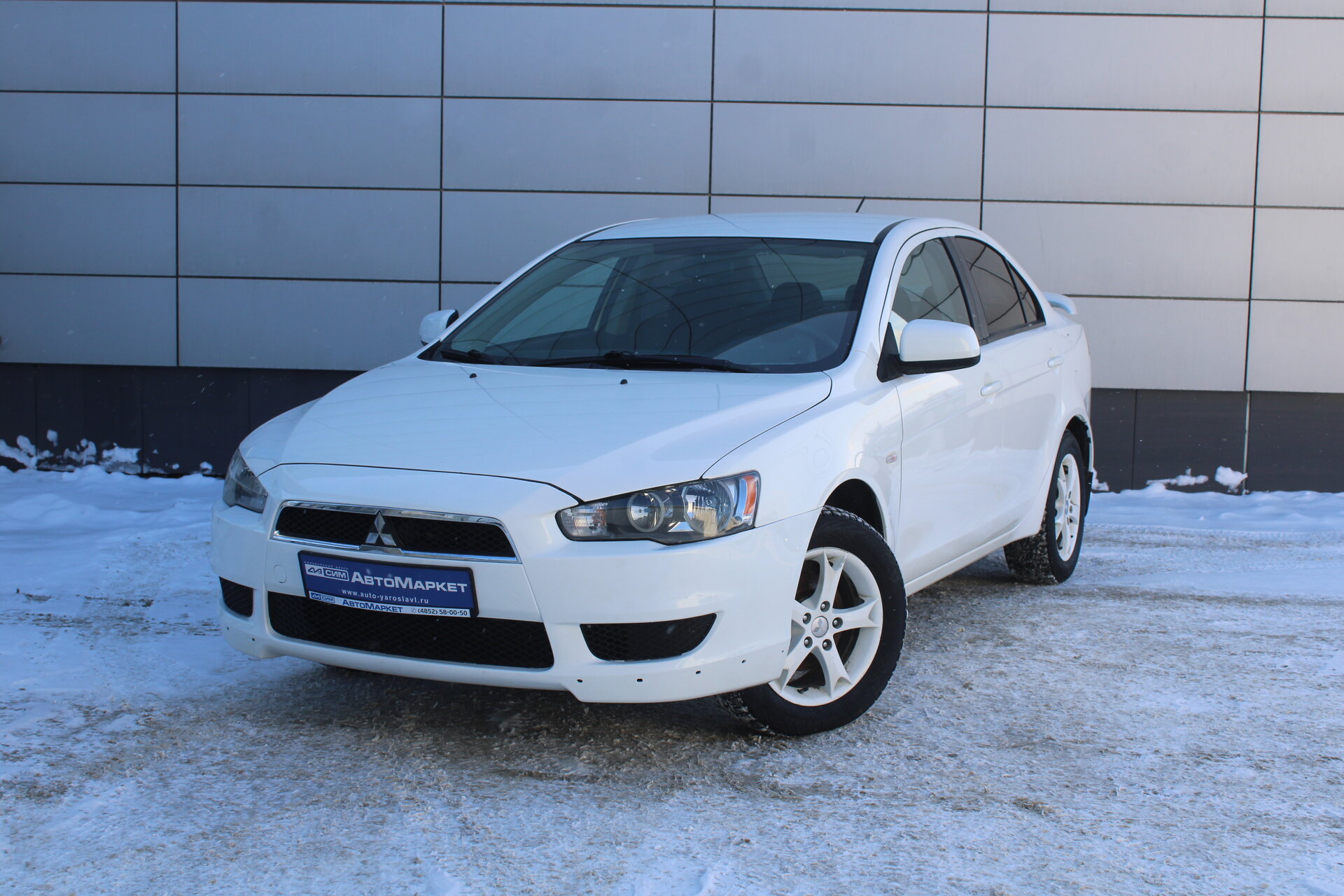 Белый Mitsubishi Lancer 1.6 MT (117 л.с.) 2013