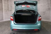 Зеленый Kia Rio 5-speed 1.6 MT (123 л.с.) 2014 фото 12