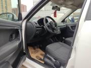 белый Skoda Fabia 1.2 MT (70 л.с.) 2013 фото 9