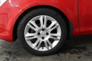 Красный Opel Corsa 1.2 AMT (80 л.с.) 2008 фото 13