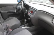 бежевый Kia Rio 1.4 AT (97 л.с.) 2010 фото 14