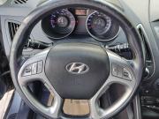 черный Hyundai ix35 2.0 AT (150 л.с.) 2014 фото 14