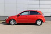 Красный Kia Rio 1.4 AT (95 л.с.) 2011 фото 4
