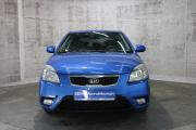 Синий Kia Rio 1.4 MT (97 л.с.) 2010 фото 1