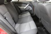 Красный Skoda Octavia 1.4 MT (75 л.с.) 2009 фото 11