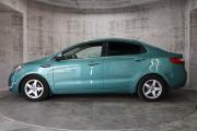 Зеленый Kia Rio 5-speed 1.6 MT (123 л.с.) 2014 фото 4