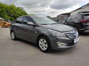 серый Hyundai Solaris 1.4 AT (107 л.с.) 2016 фото 19