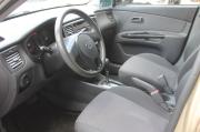бежевый Kia Rio 1.4 AT (97 л.с.) 2010 фото 13