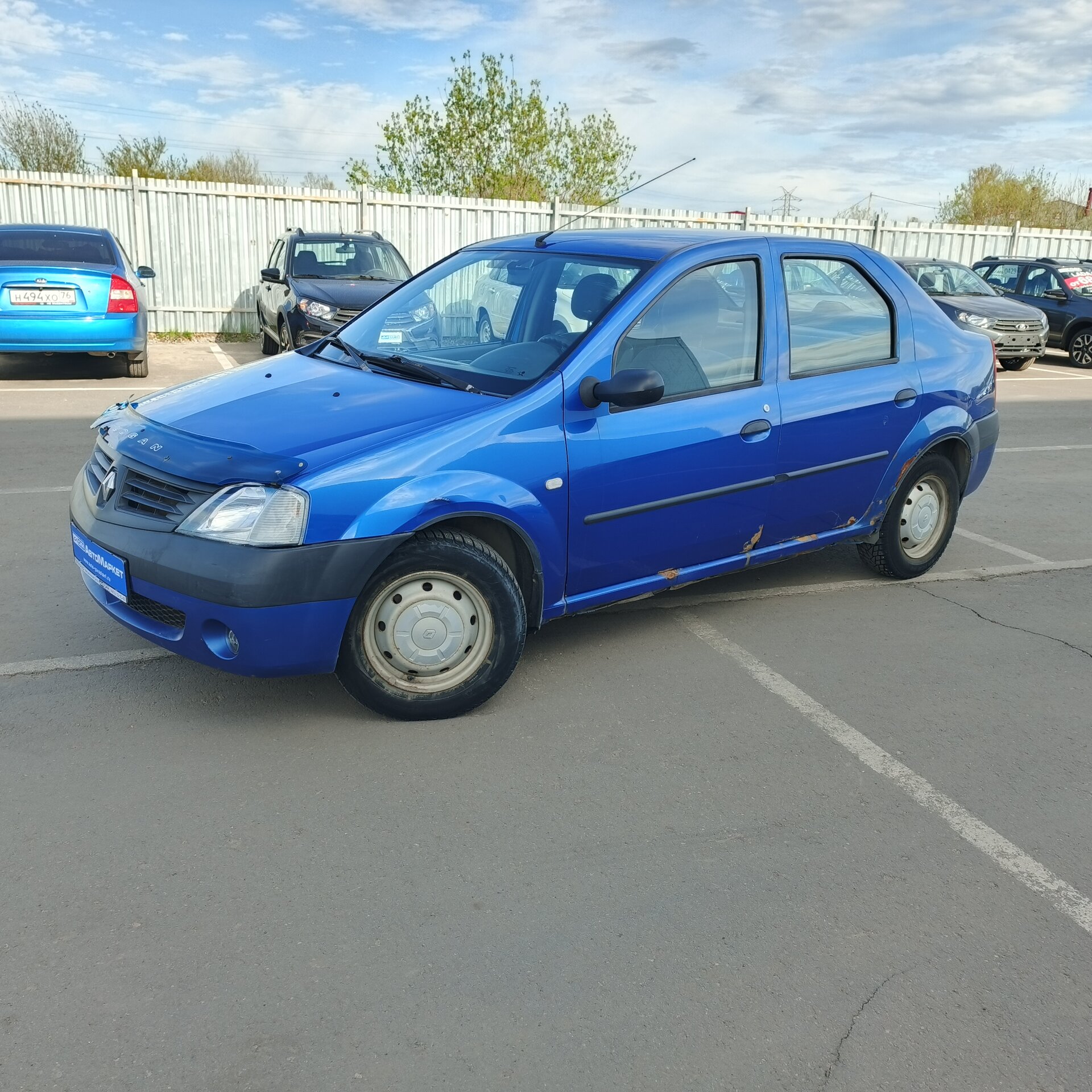 Синий Renault Logan 1.4 MT (75 л.с.) 2006
