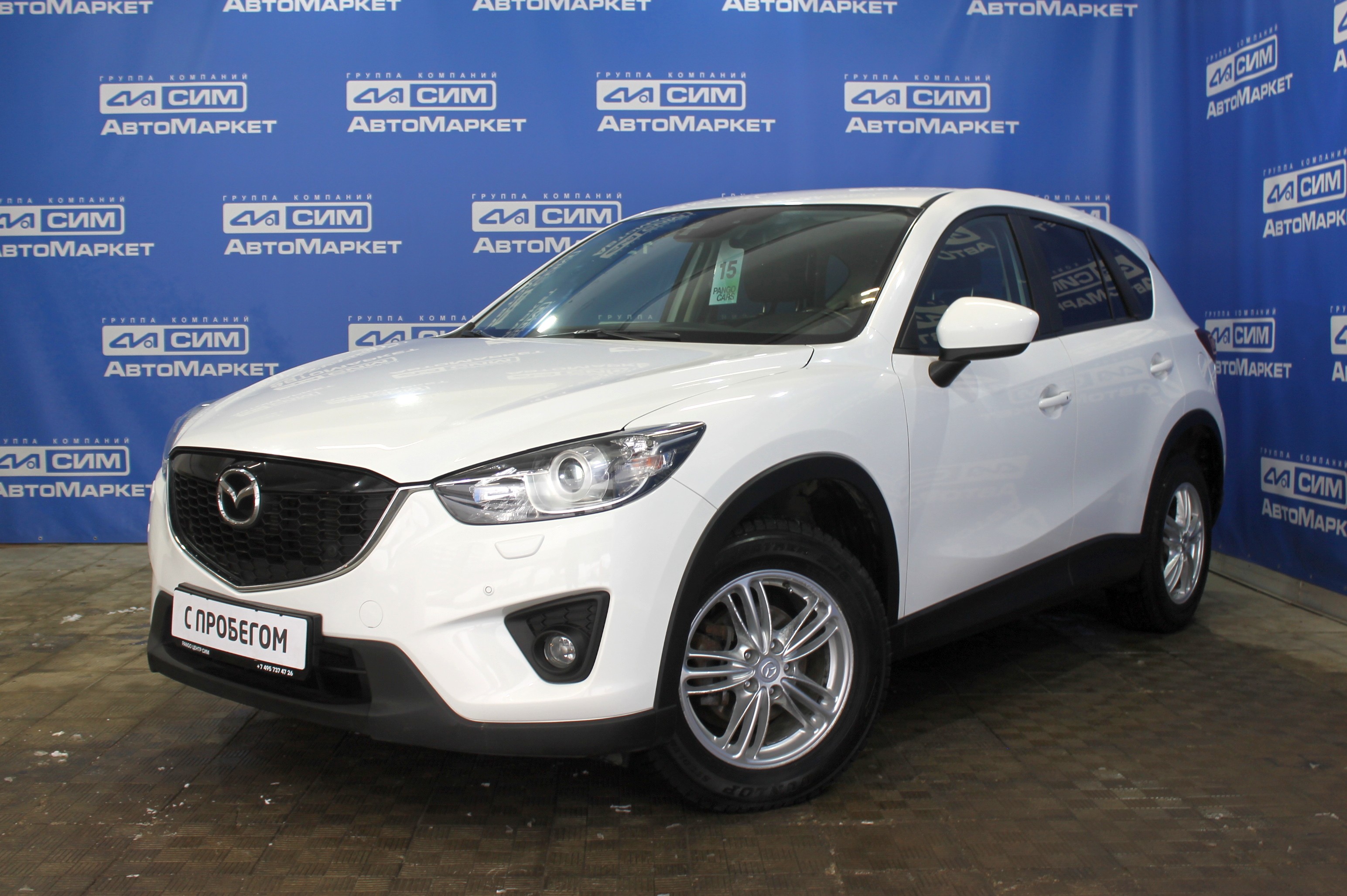 белый Mazda CX-5 2.0 AT (150 л.с.) 4WD 2012