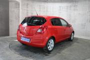 Красный Opel Corsa 1.2 AMT (80 л.с.) 2008 фото 5