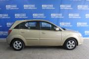 бежевый Kia Rio 1.4 AT (97 л.с.) 2010 фото 4