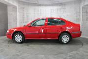 Красный Skoda Octavia 1.4 MT (75 л.с.) 2009 фото 4