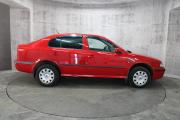 Красный Skoda Octavia 1.4 MT (75 л.с.) 2009 фото 3