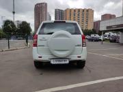 белый Suzuki Grand Vitara 2.0 AT (140 л.с.) 4WD 2011 фото 6