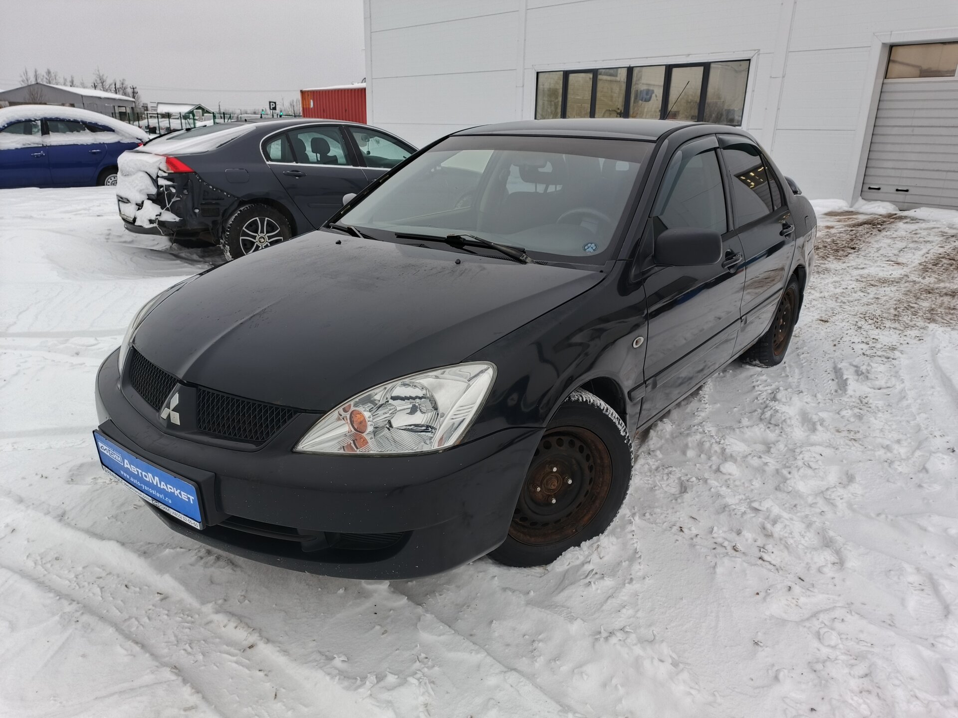 Черный Mitsubishi Lancer 1.6 MT (98 л.с.) 2007