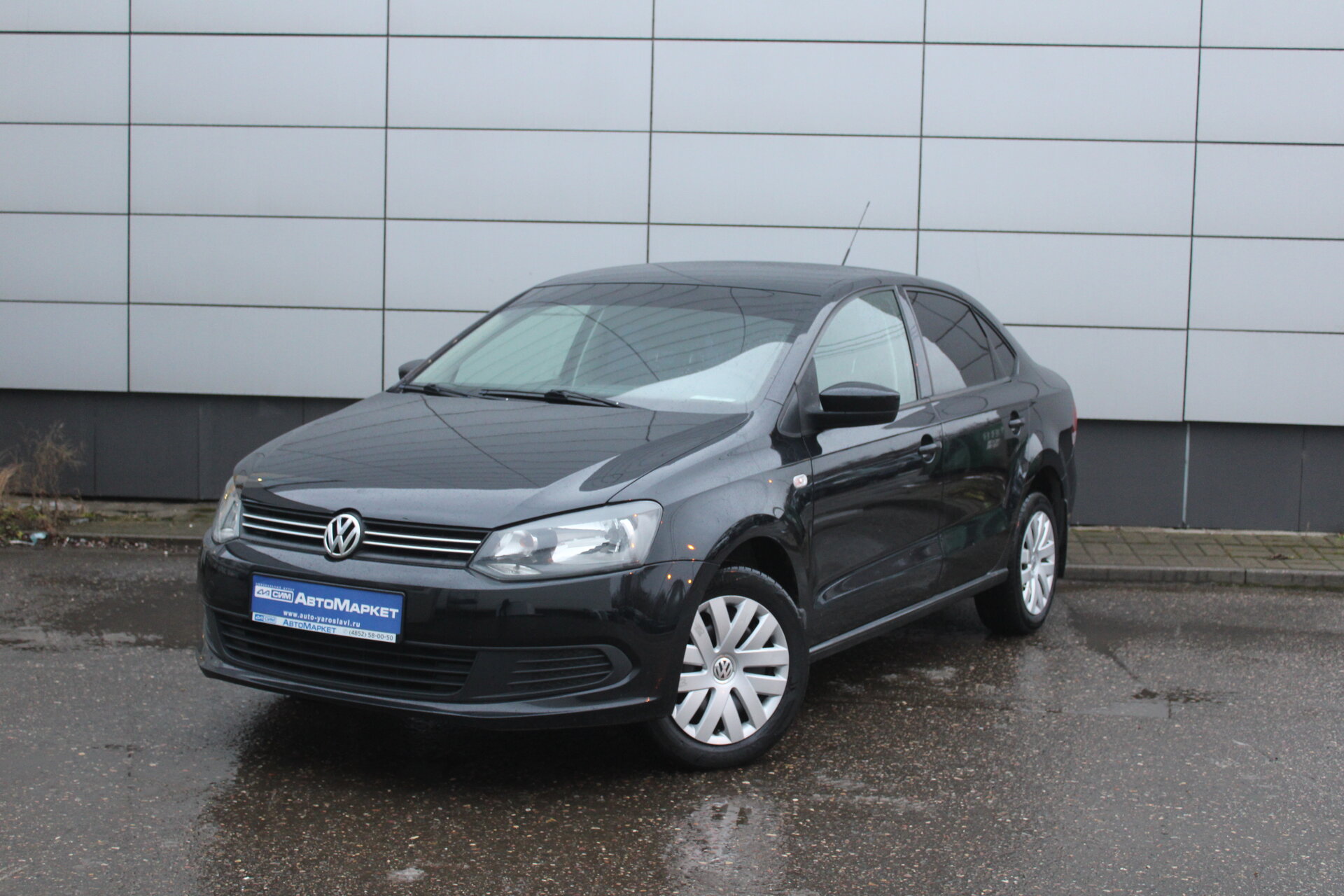Черный Volkswagen Polo 1.6 MT (105 л.с.) 2011