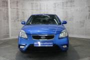 Синий Kia Rio 1.4 MT (97 л.с.) 2010 фото 1