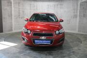 Красный Chevrolet Aveo 1.6 MT (115 л.с.) 2012 фото 1