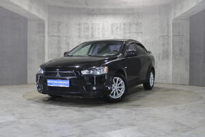 Черный Mitsubishi Lancer 1.5 MT (109 л.с.) 2010