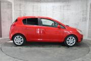 Красный Opel Corsa 1.2 AMT (80 л.с.) 2008 фото 3
