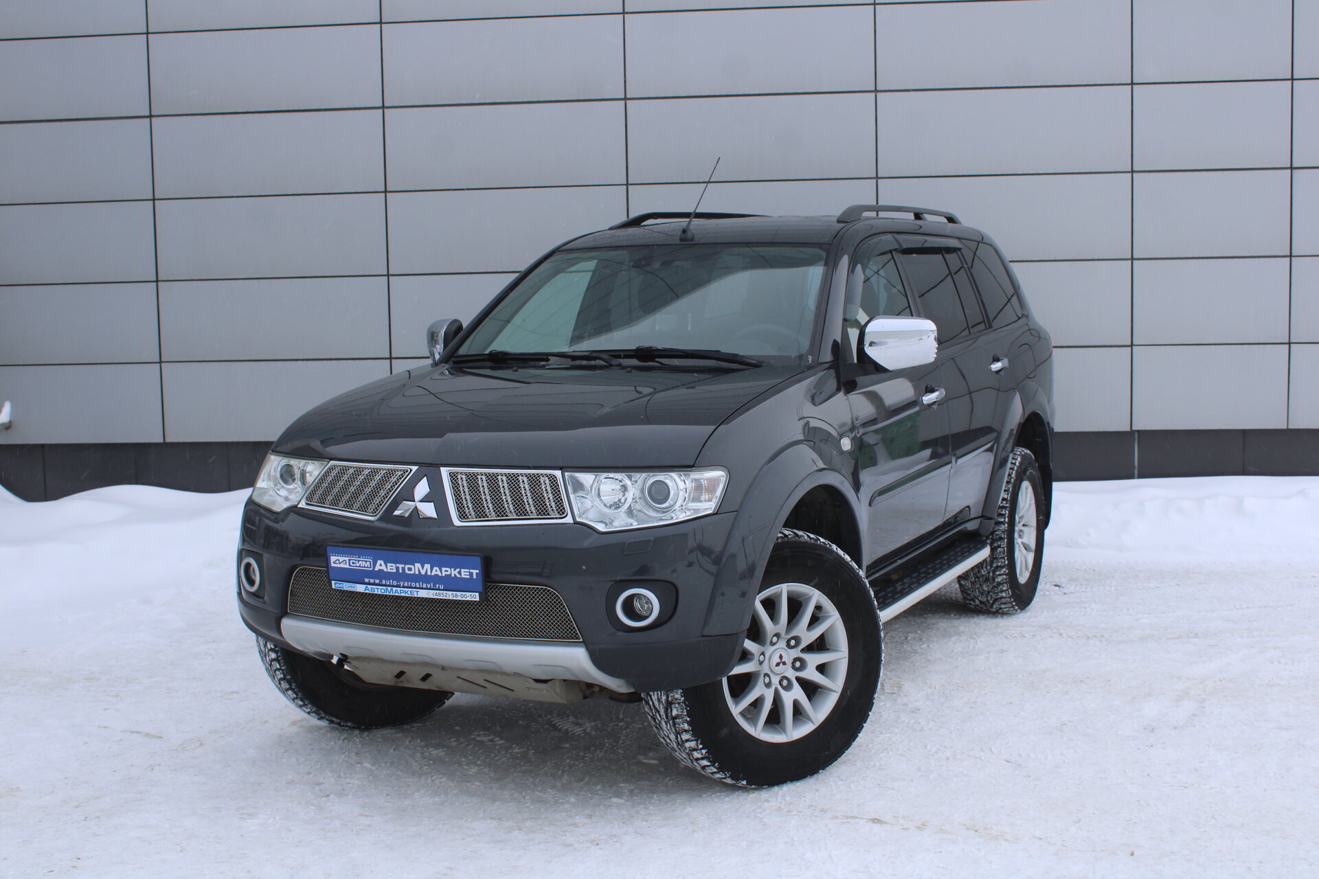 Черный Mitsubishi Pajero Sport 2.5d AT (178 л.с.) 4WD 2012