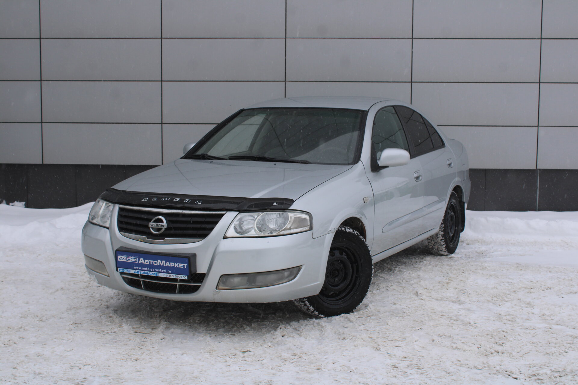 Серебряный Nissan Almera Classic 1.6 MT (107 л.с.) 2011