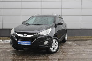 Черный Hyundai Tucson 2.0 AT (164 л.с.) 4WD 2011