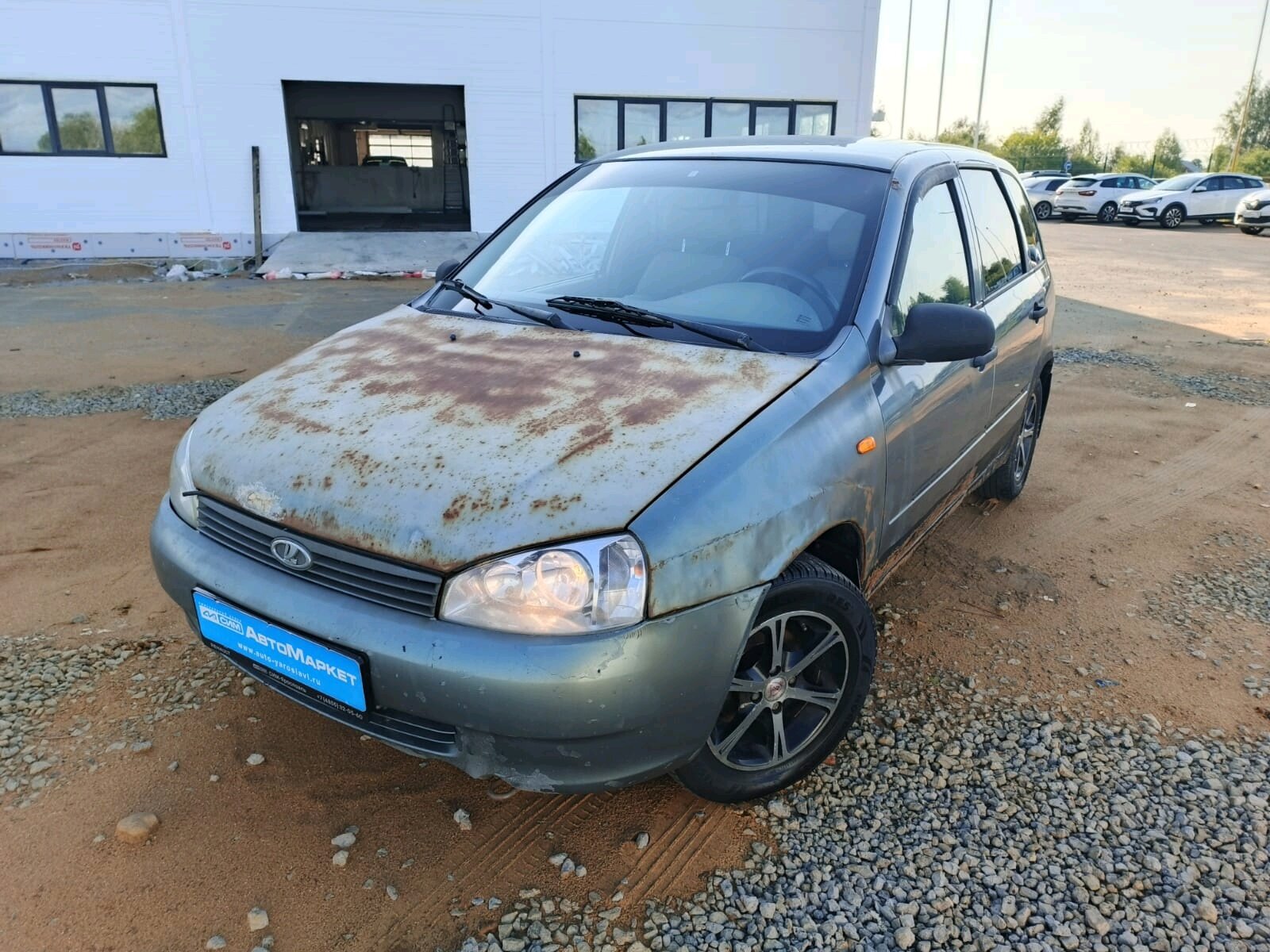 Серый Lada (ВАЗ) Kalina 1.6 MT (81 л.с.) 2008