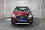 Красный Renault Sandero Stepway 1.6 AT (103 л.с.) 2012 фото 1