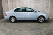 Голубой Toyota Corolla 1.6 MT (110 л.с.) 2006 фото 3