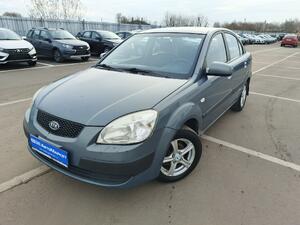 Серый Kia Rio, II 1.4 MT (97 л.с.) 2006