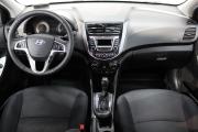 Черный Hyundai Solaris 1.6 AT (123 л.с.) 2014 фото 8