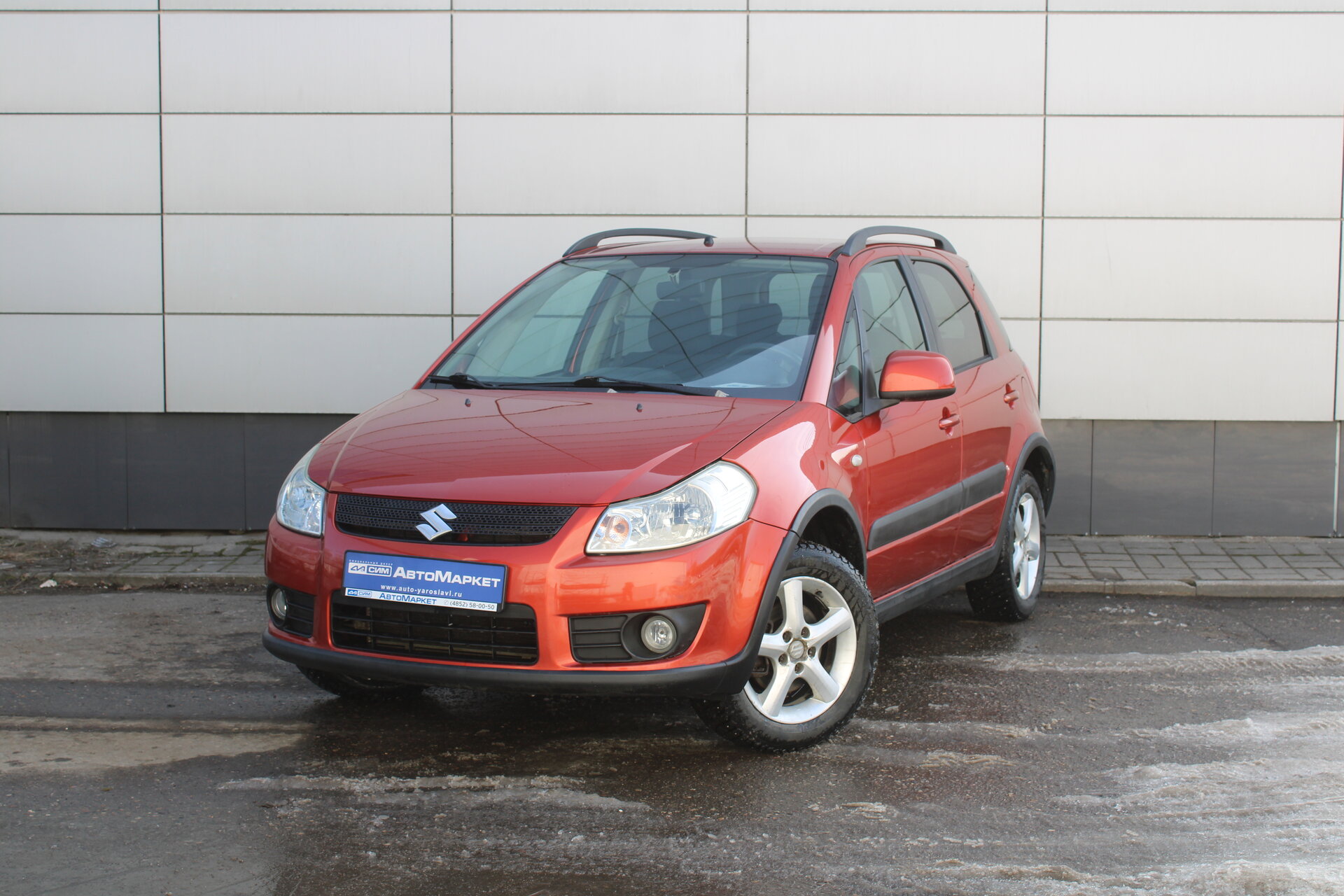 Оранжевый Suzuki SX4 1.6 MT (107 л.с.) 4WD 2008