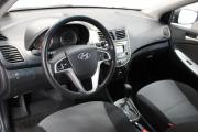 Синий Hyundai Solaris 1.4 AT (107 л.с.) 2014 фото 9