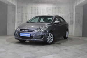 Серый Hyundai Solaris 1.6 AT (123 л.с.) 2012