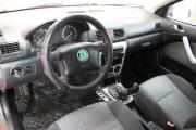 Красный Skoda Octavia 1.4 MT (75 л.с.) 2009 фото 9