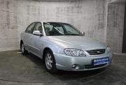 Серебряный Kia Spectra 1.6 MT (101 л.с.) 2008 фото 2