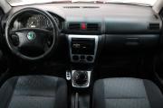 Красный Skoda Octavia 1.4 MT (75 л.с.) 2009 фото 8