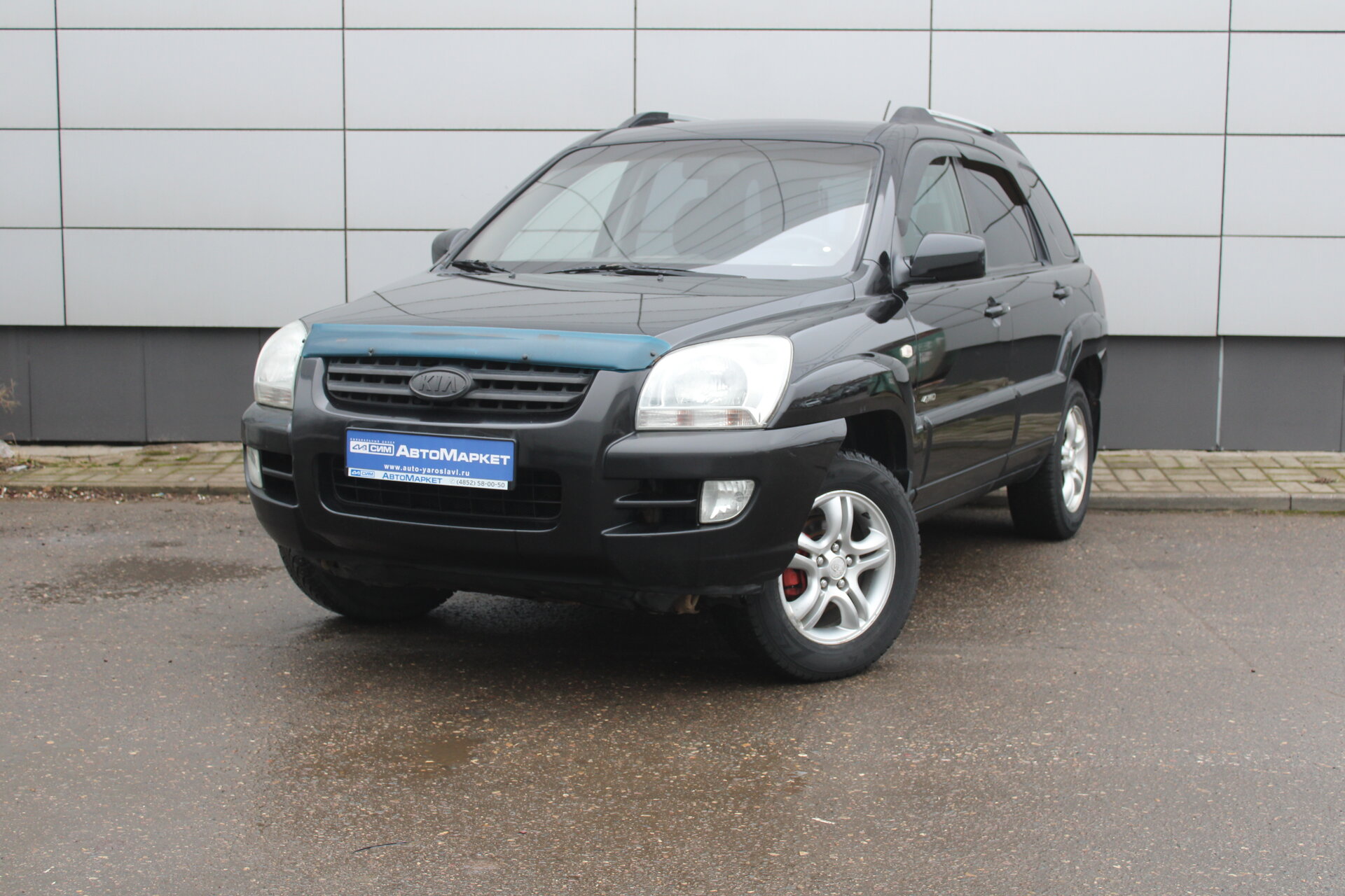 Черный Kia Sportage, II 2.0 MT (141 л.с.) 4WD 2007