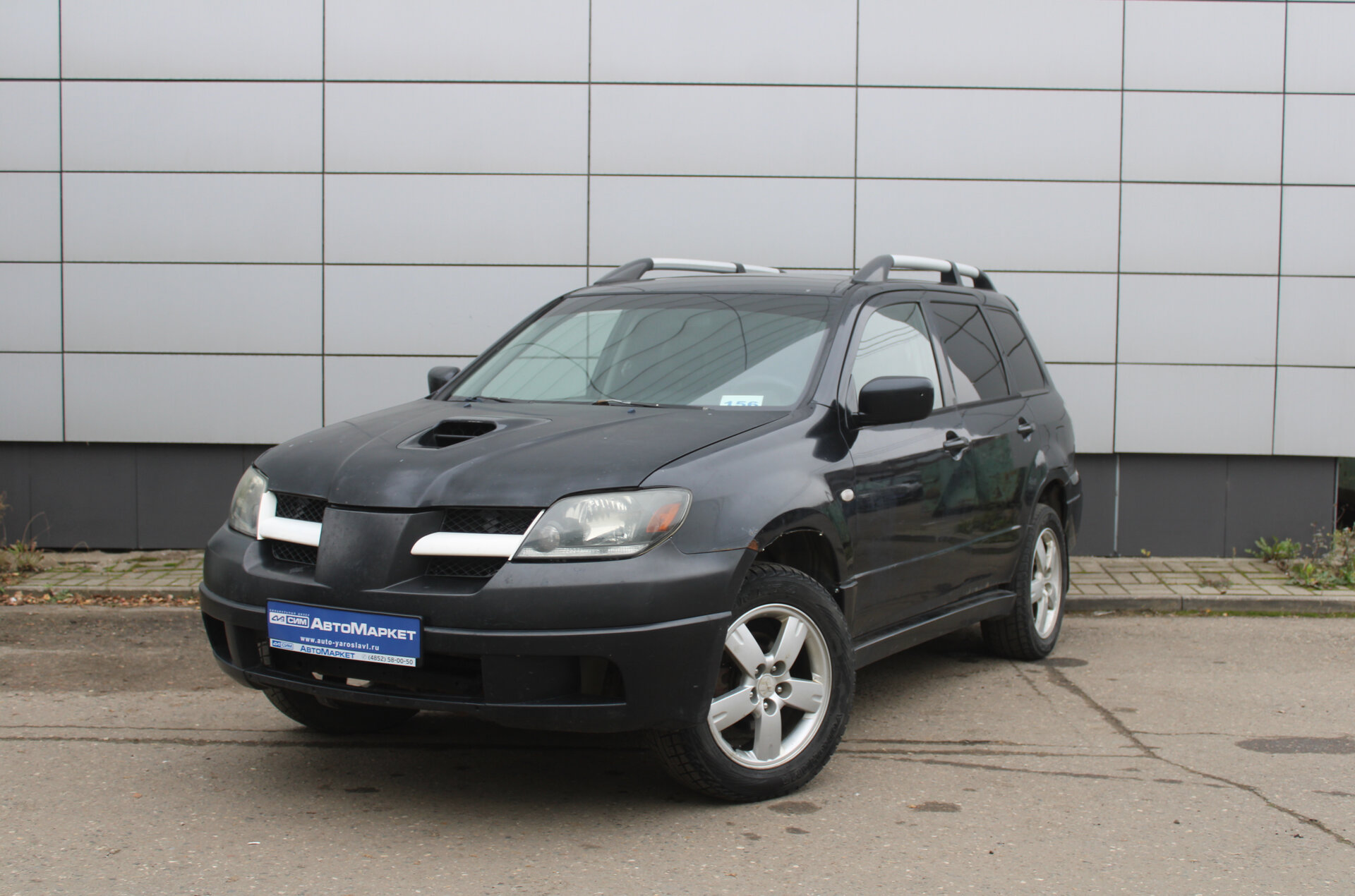 Черный Mitsubishi Outlander 2.4 AT (160 л.с.) 4WD 2004
