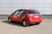 Красный Kia Rio 1.4 AT (95 л.с.) 2011 фото 7