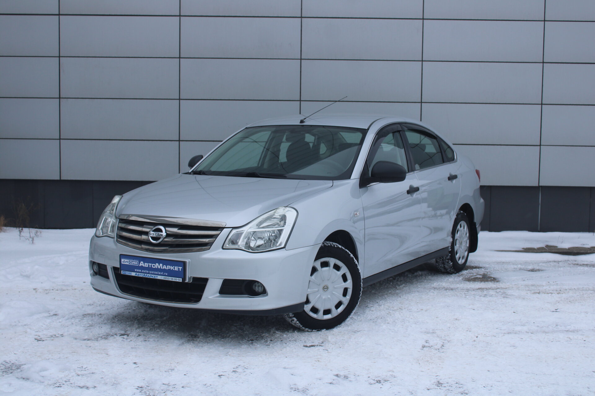 Серебряный Nissan Almera 1.6 MT (102 л.с.) 2014