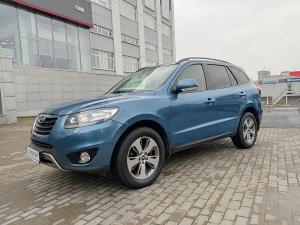 голубой Hyundai Santa Fe 2.4 AT (174 л.с.) 4WD 2011