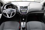 Фиолетовый Hyundai Solaris 1.6 AT (123 л.с.) 2012 фото 8