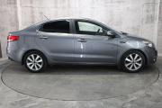 Серый Kia Rio 1.6 AT (123 л.с.) 2016 фото 3