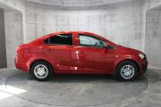 Красный Chevrolet Aveo 1.6 MT (115 л.с.) 2012 фото 3